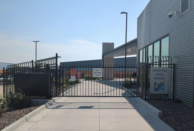Commercial vertical lift security gate